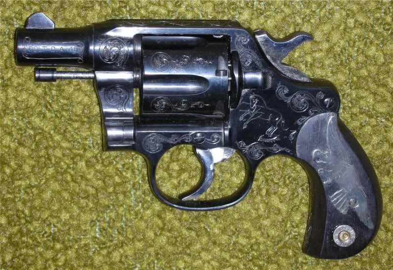 Black modern ingraved pistol